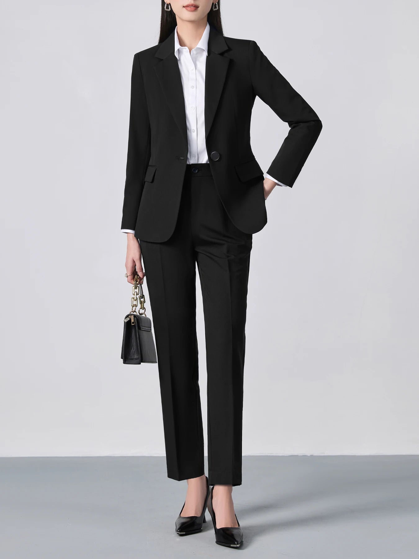 Ansoff single-breasted one-button suit set featuring a slim-fit, solid-color long-sleeve jacket with notch lapel and elegant matching trousers.