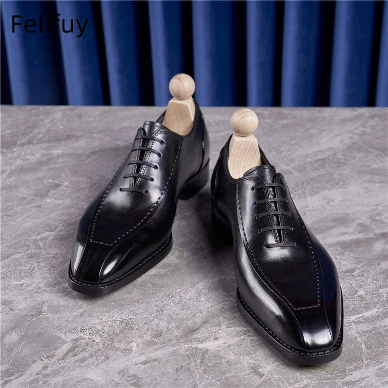 Black genuine leather men's Oxford shoes by Ansoff with a British style, handmade, luxury, comfortable for wedding and formal occasions.
