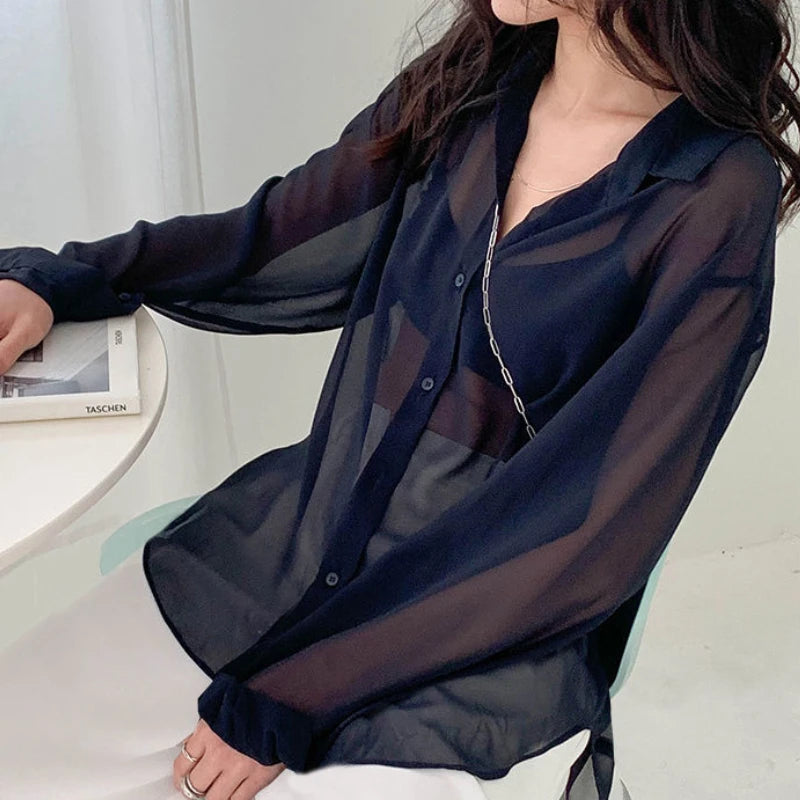 Women’s sheer sun-proof summer shirt by Ansoff featuring long sleeves, turn-down collar, elegant and all-match fashion style.