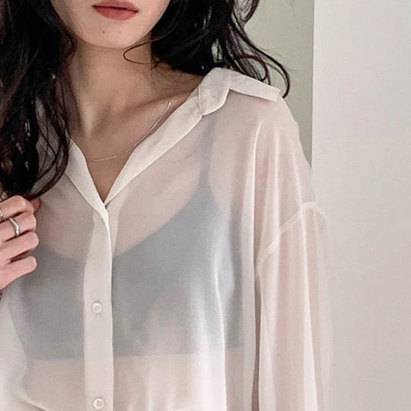 Women’s sheer summer shirt by Ansoff featuring long sleeves, turn-down collar, and elegant sun-proof, simple solid outerwear.