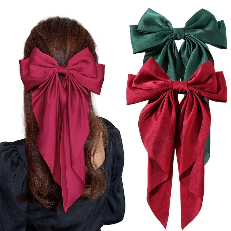 Ansoff Korean satin hair clips featuring large bowknot and long ribbon design, spring clamp barrette for women and girls