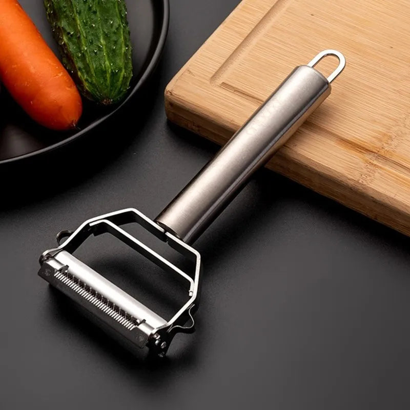 Ansoff stainless steel double-head vegetable peeler with ergonomic handle, ideal for peeling fruits and vegetables efficiently.