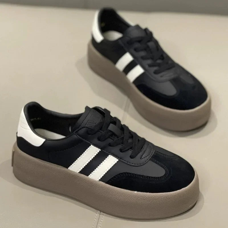 Ansoff women's casual sports shoes with thick soles, soft cowhide upper, and comfortable training shoe design.