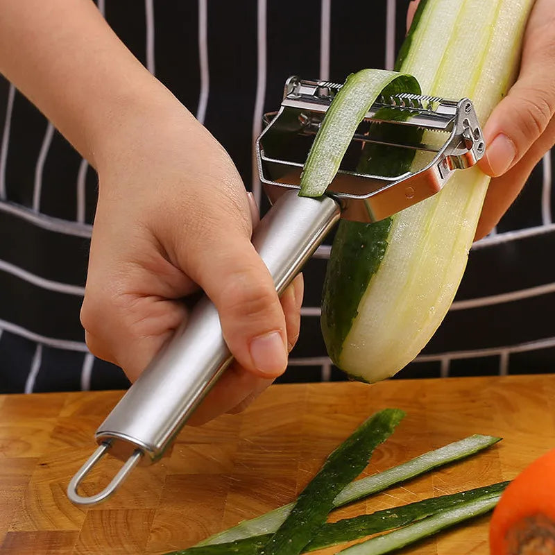 Ansoff stainless steel double-head vegetable peeler with ergonomic handles, suitable for peeling fruits and vegetables in the kitchen.