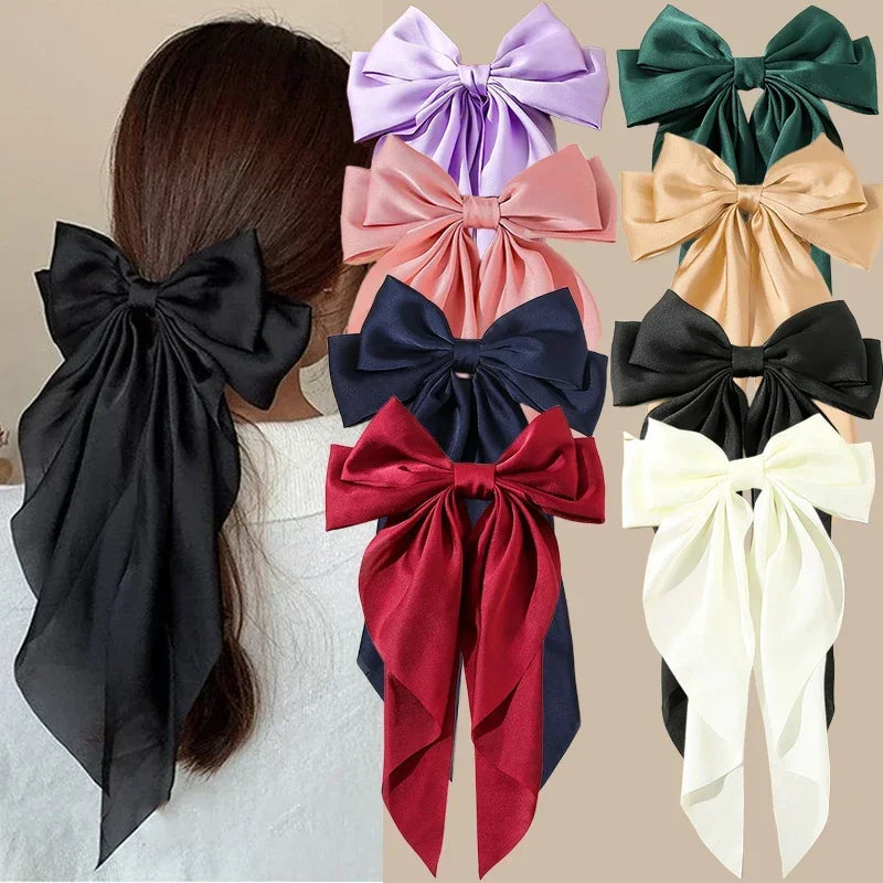 Ansoff Korean hair accessories featuring large satin bowknot clips with long ribbons for women and girls, spring clamp design.