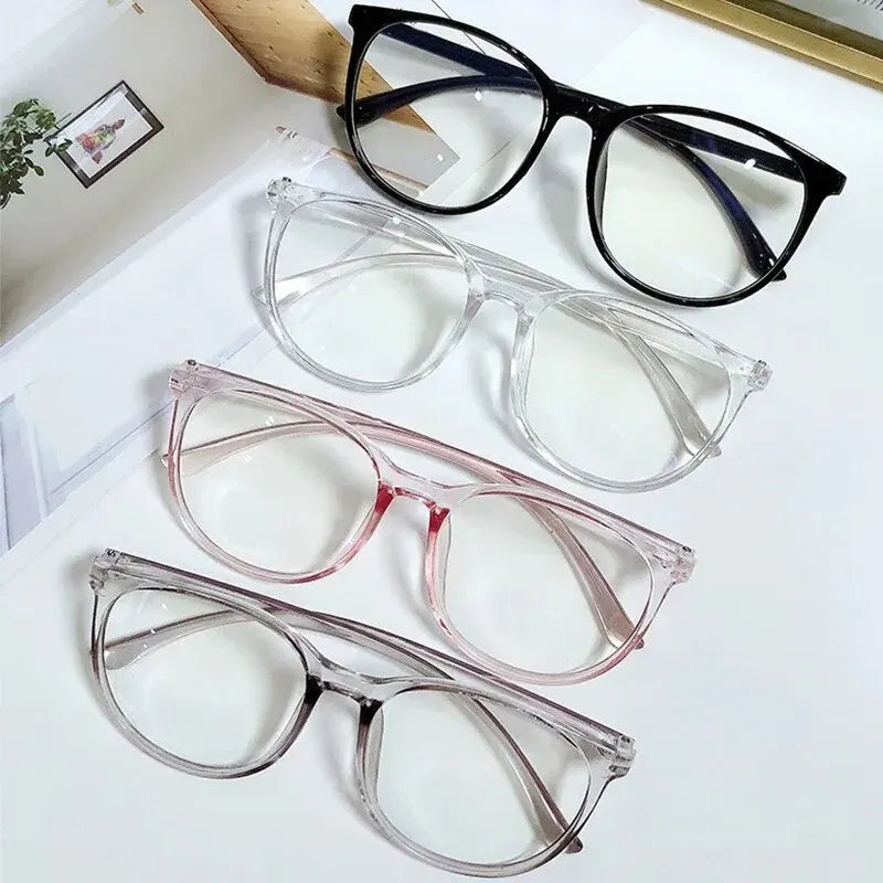 Clear anti-blue light glasses from Ansoff with replaceable lenses, designed to block blue light and reduce eye strain for women and men.