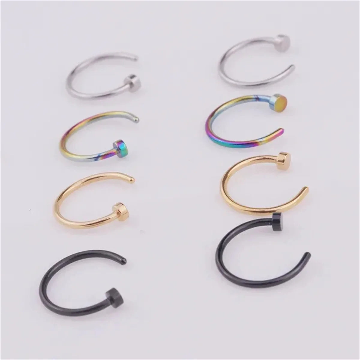 Set of 2/10 stainless steel fake nose rings for women and men, clip-on labret lip and nose piercing jewelry by Ansoff.