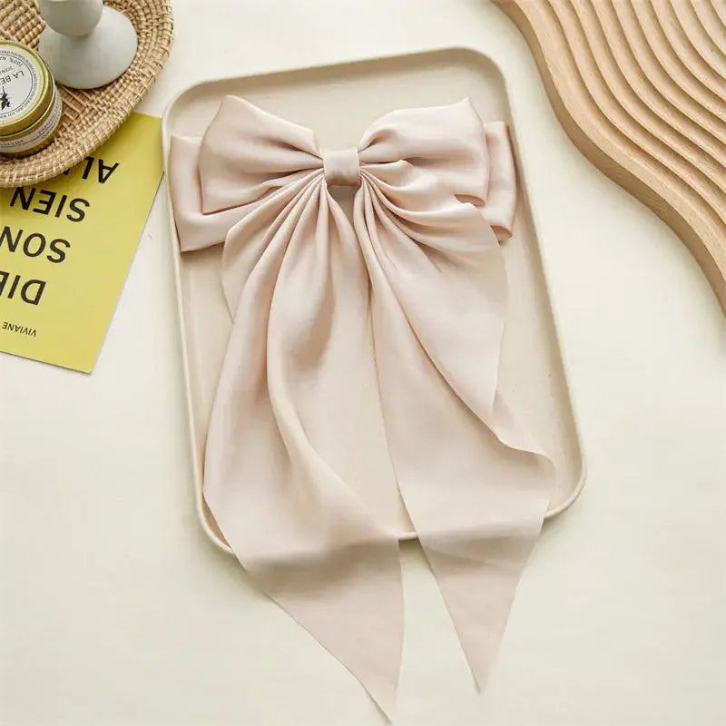Ansoff Korean satin hair clips featuring large bowknot and long ribbon, spring clamp barrette for women and girls.