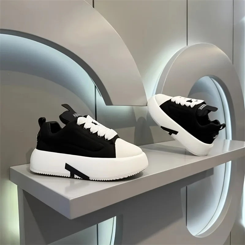 Ansoff men's slip-resistant casual shoes in a solid color, featuring comfortable design suitable for outdoor walks and jogging.