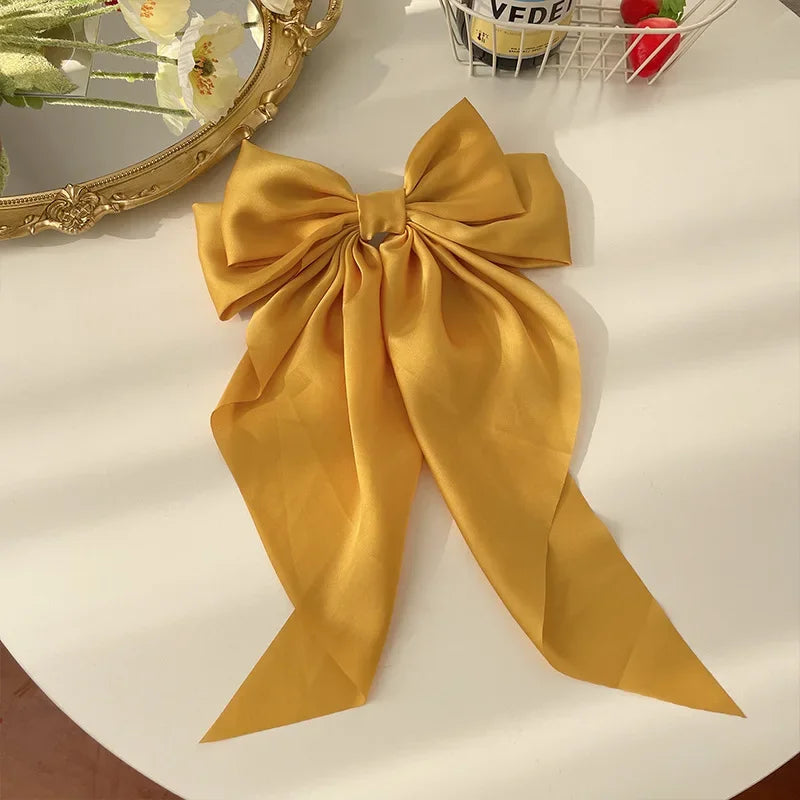 Ansoff Korean satin hair clip with a large bowknot and long ribbon, suitable for women and girls, spring clamp barrette.