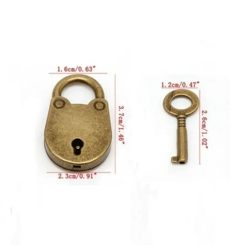 Vintage metal lock and key padlock by Ansoff, antique-style mini lock with intricate details and matching key.