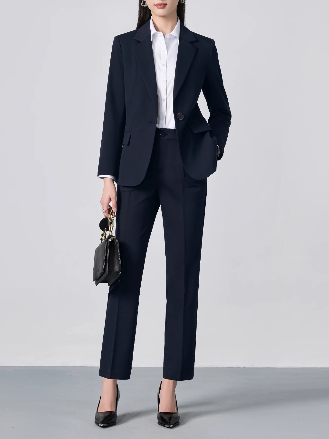 Ansoff single-breasted one-button suit set with slim fit, solid color long-sleeve blazer, notch lapel, and matching trousers.