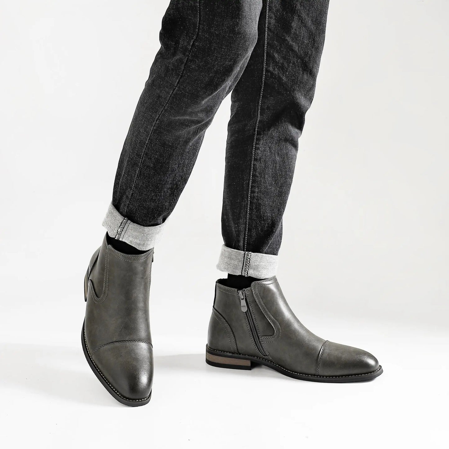 Men's leather fashion boots by Ansoff, comfortable and stylish footwear for 2025, featuring a sleek design and durable sole.