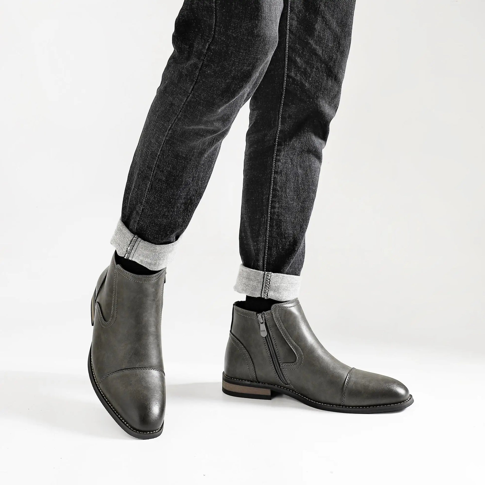 Men's leather fashion boots by Ansoff, comfortable and stylish footwear for 2025, featuring a sleek design and durable sole.