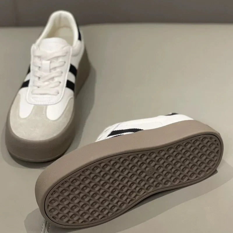 Ansoff women's sports shoes with thick soles, casual board style, soft cowhide upper, and comfortable inside padding.