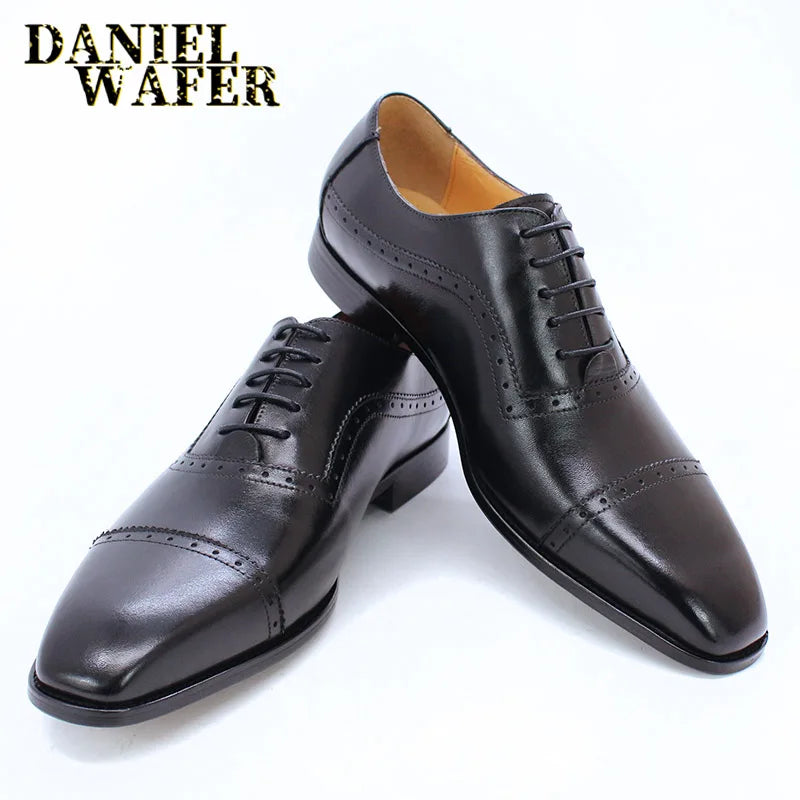 Black and brown leather men's Oxford shoes by Ansoff, featuring brogue detailing, cap toe, lace-up design, suitable for formal and wedding wear.