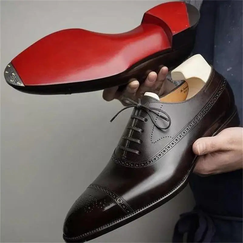 Men's red sole Oxfords by Ansoff featuring carved brogue detailing, lace-up design, suitable for business, casual, and party wear.