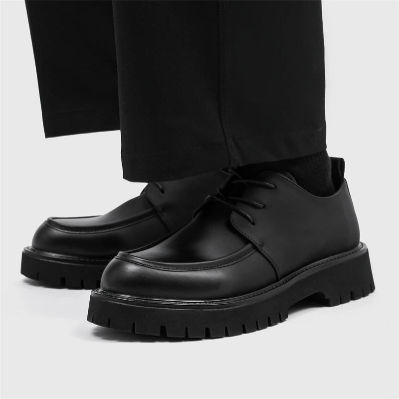 Men's black leather casual dress shoes with thick platform soles, patent leather finish, and large toe design by Ansoff.