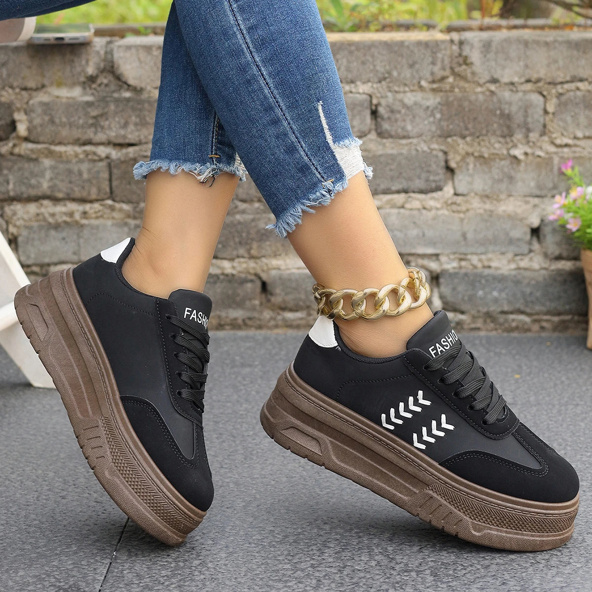 Ansoff women's sports shoes with round toe, thick sole, anti-slip design, perfect for work or casual wear.