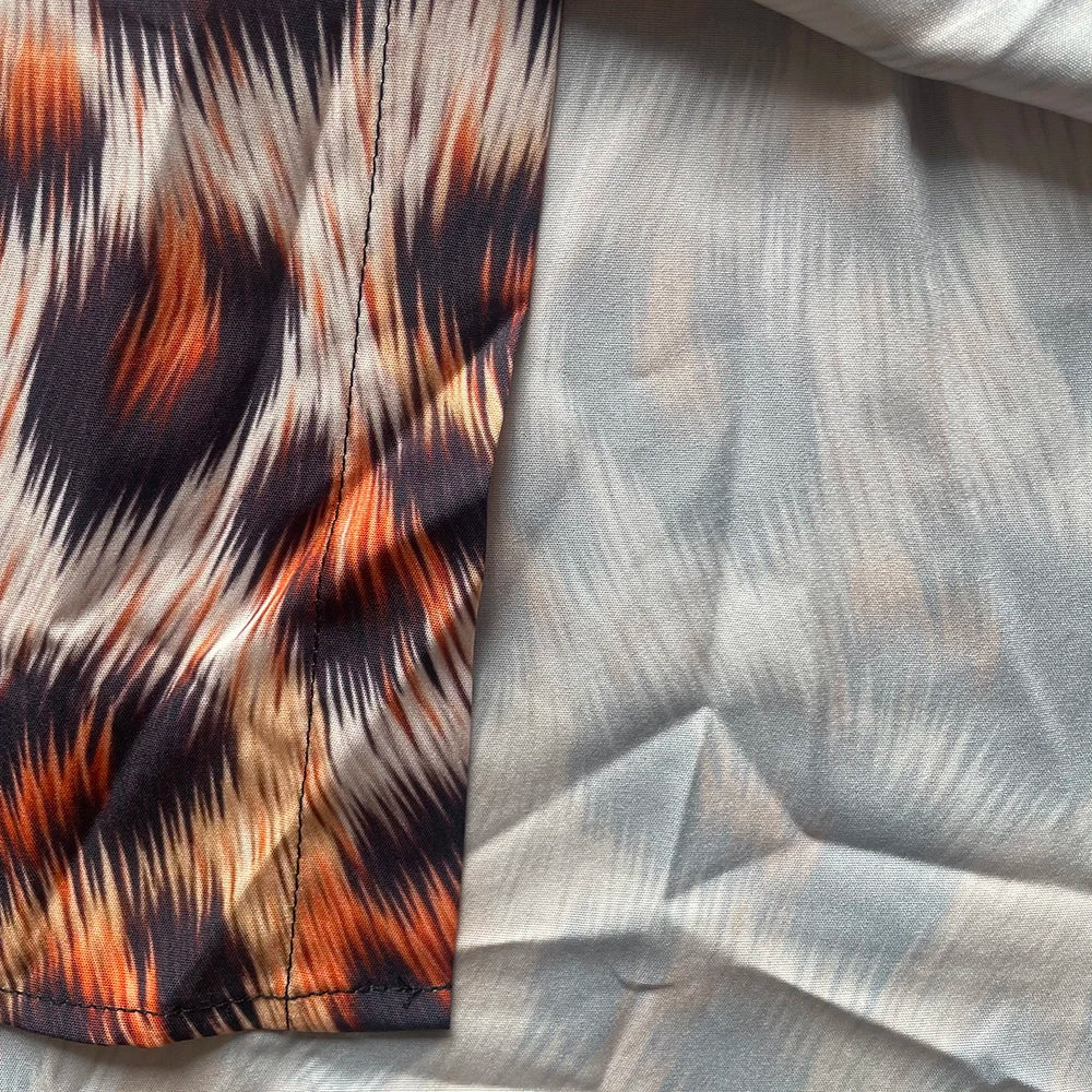 Ansoff Hawaiian button-up shirt with retro floral print, long sleeves, casual streetwear style, dark academia-inspired resort wear