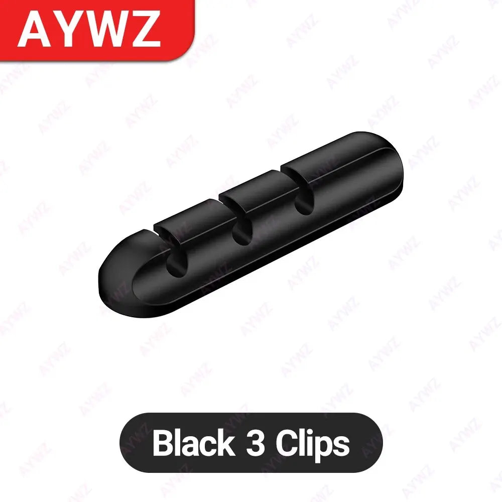 Ansoff adhesive cable holder clips organizing desktop USB charging, power, and mouse cables for wire management.