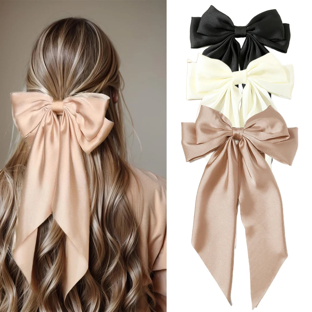 Ansoff Korean hair accessories featuring large satin bowknot clips with long ribbons for women and girls, spring clamp design