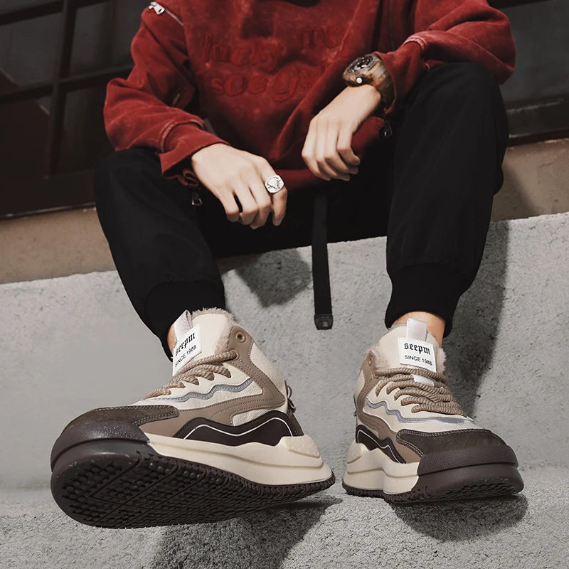 Men's Ansoff winter tooling boots with non-slip soles, round toe, ankle height, durable cotton material, ideal for outdoor casual wear.