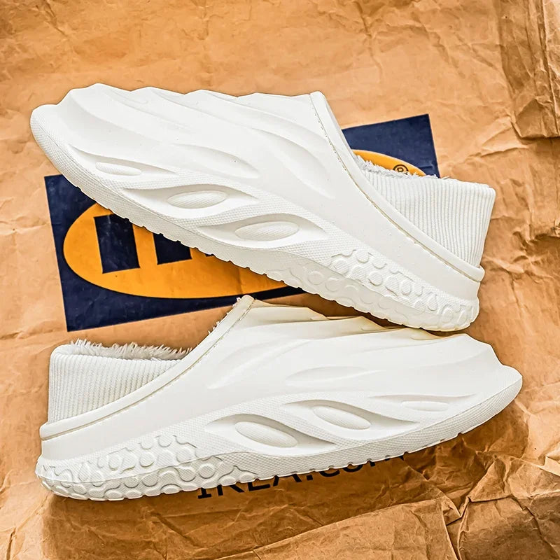 Ansoff men's velvet slipper with non-slip sole and waterproof design, featuring a cozy heel covering for home wear.