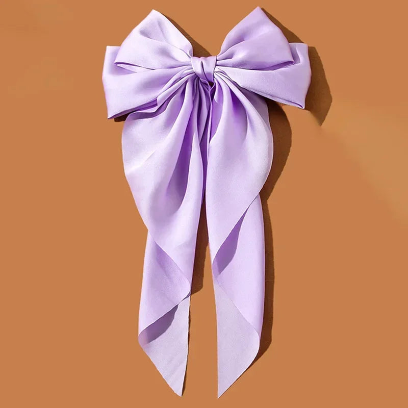 Ansoff Korean hair accessories featuring large satin bowknot clips with long ribbons for women and girls, spring clamp barrette.
