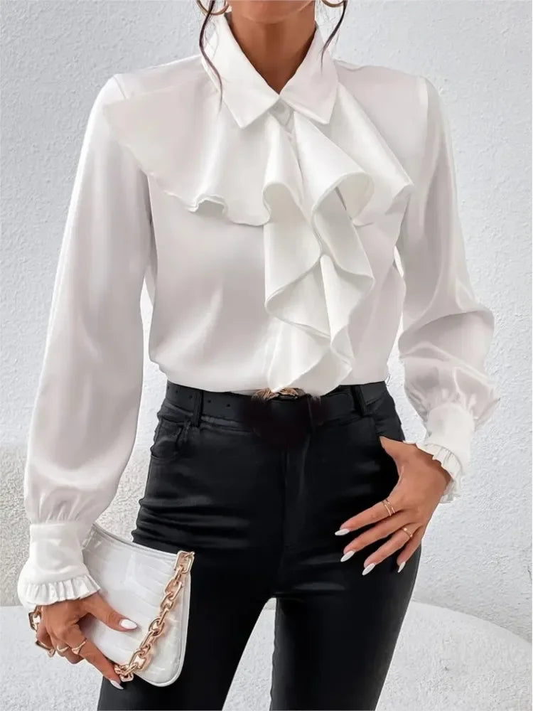 Elegant white ruffled blouse by Ansoff featuring long sleeves, lapel collar, and solid design, ideal for spring and autumn wear.
