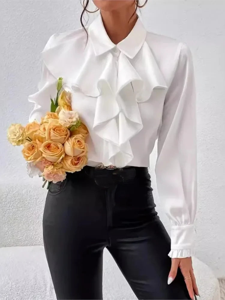 Elegant white ruffled blouse by Ansoff featuring long sleeves, lapel collar, perfect for spring and autumn office wear.