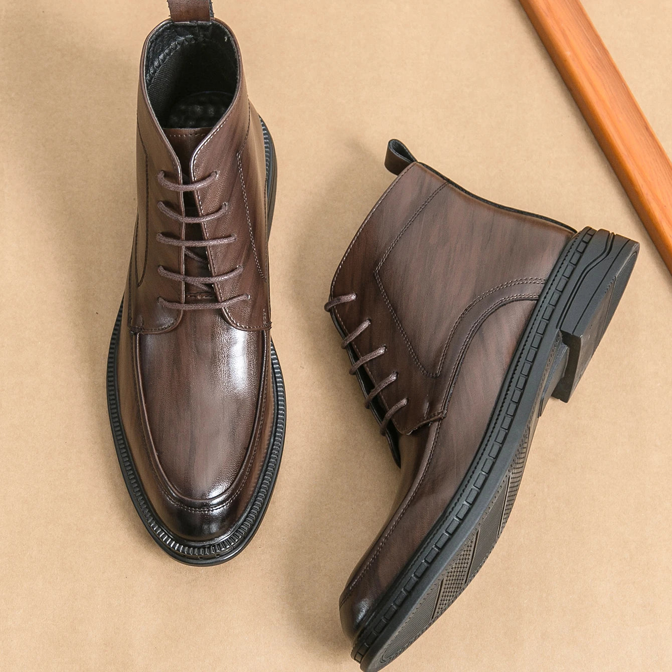 Ansoff men's leather Oxford boots with pointed toes and ankle height, featuring a sleek, fashionable design for business and dress occasions.