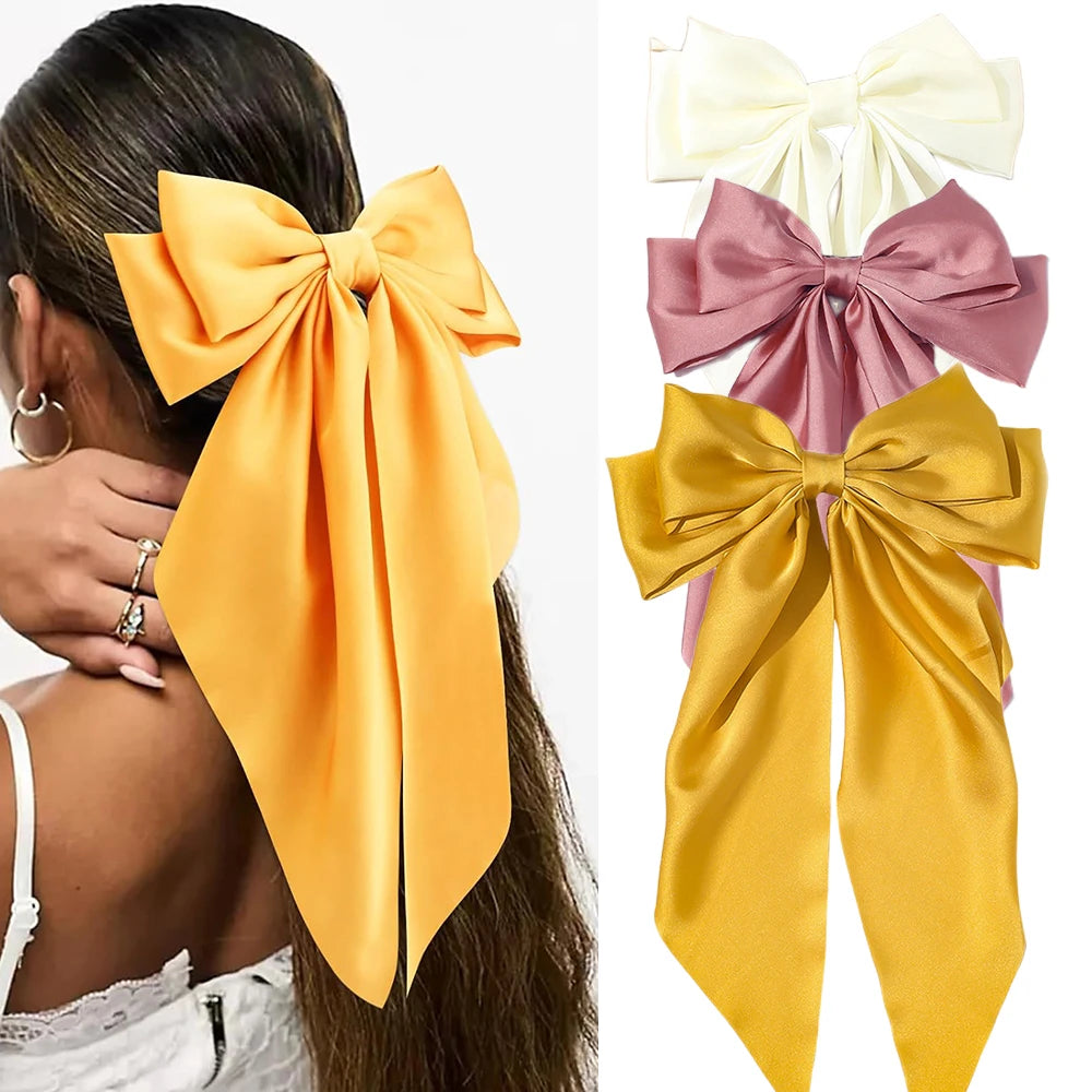 Ansoff Korean hair accessories featuring large satin bowknot hair clips with long ribbons, spring clamp for women and girls.