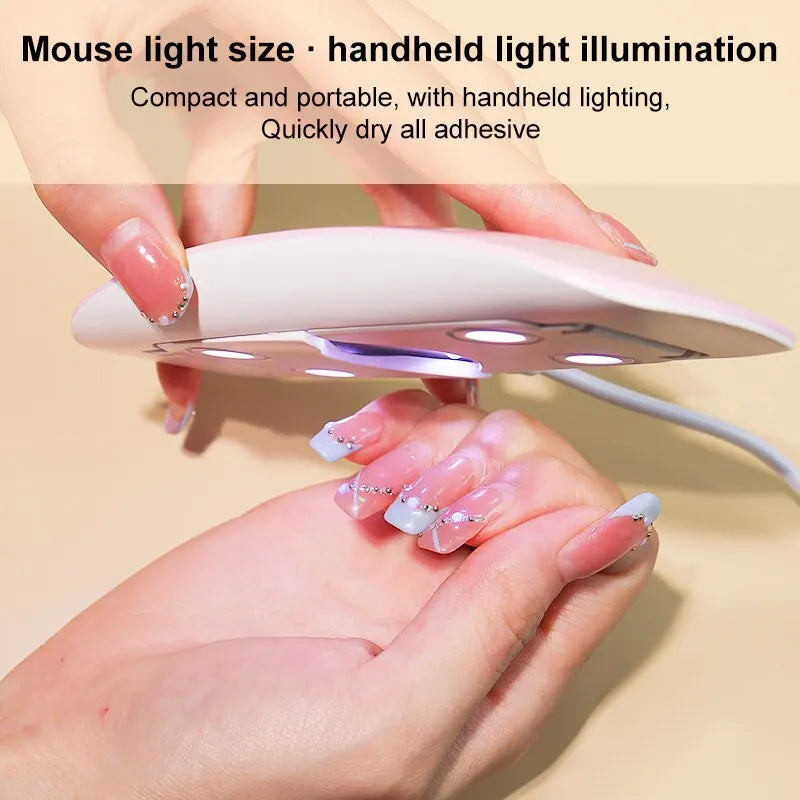 Ansoff 6W mini nail dryer with 6 LED UV lights, portable design, USB cable, for home drying of nail polish and varnish.